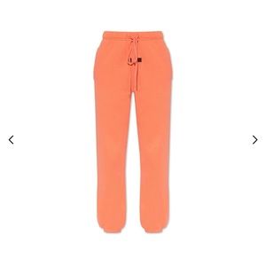 Coral FEAR OF GOD Essentials sweatpants
